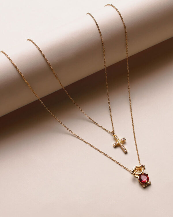 TWIN 14 CT GOLD NECKLACES WITH 14 CT BIRTHSTONE PENDANT AND 14 CT DIAMOND CROSS PENDANT